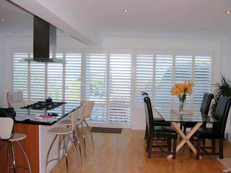Large interior  louvre shutters in white